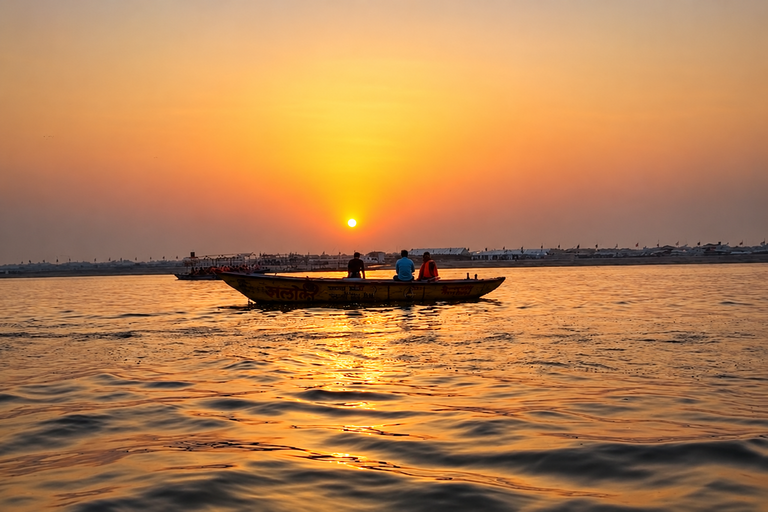 Boats on the Ganges in golden light